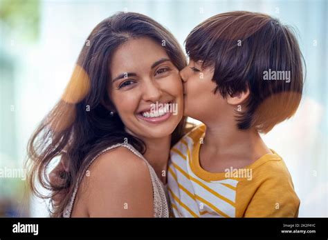 Mom and Son Kissing at Room